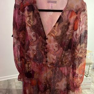 Item is NWOT. Beautiful . Picture does not do this dress justice .